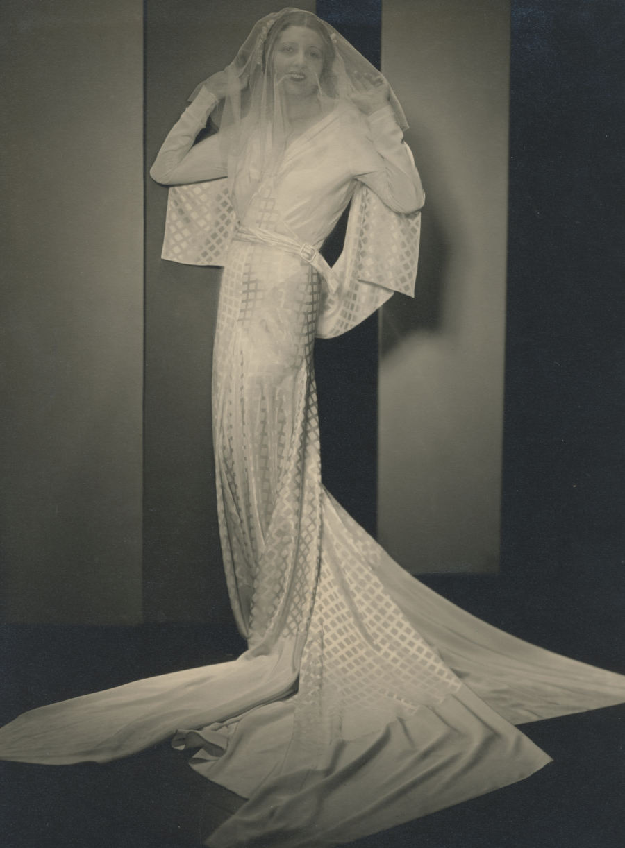 Martine PEYRE wearing a wedding gown